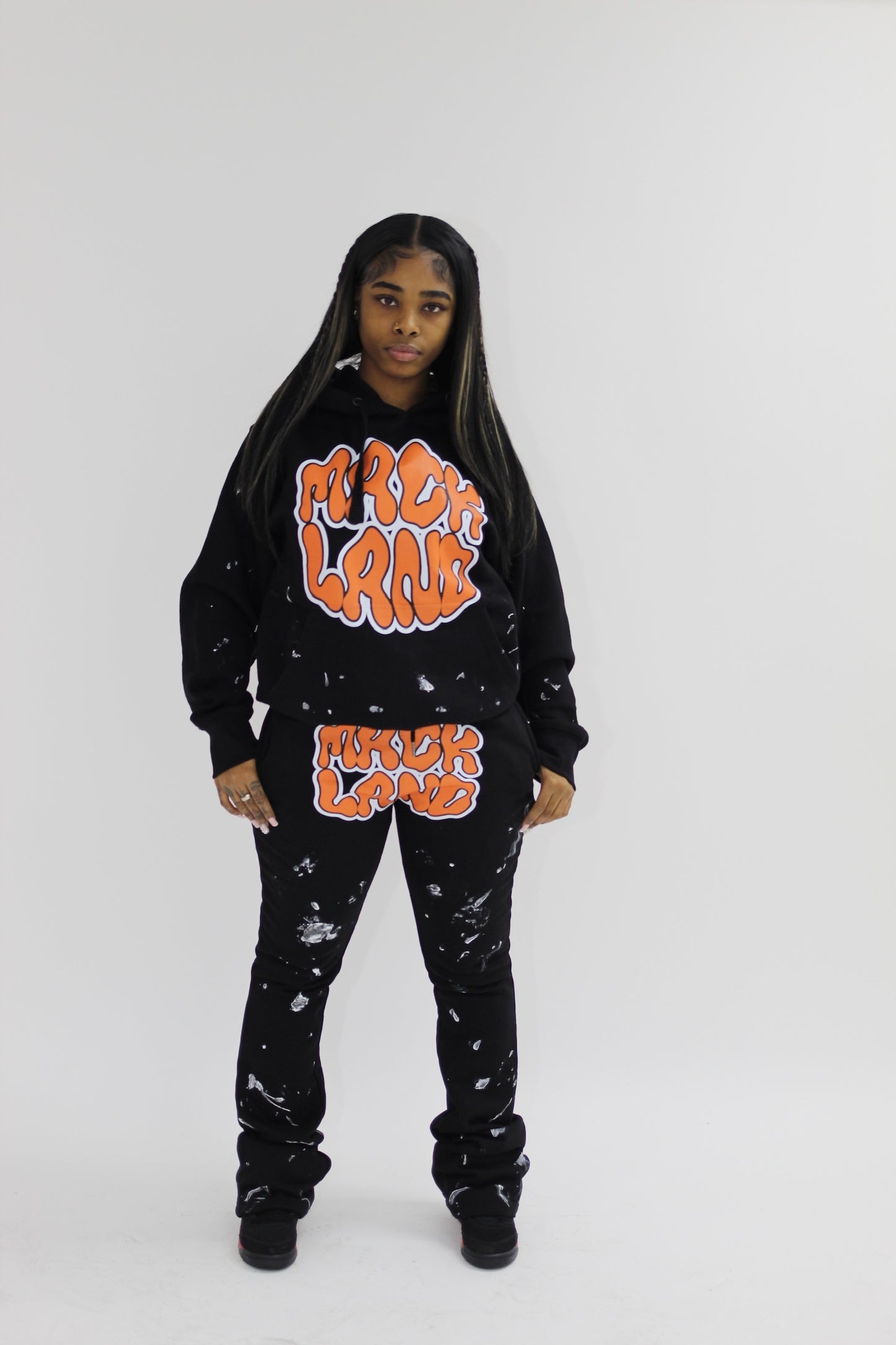 MACKLAND ORANGE BLACK FLARE PAINT SWEATSUIT